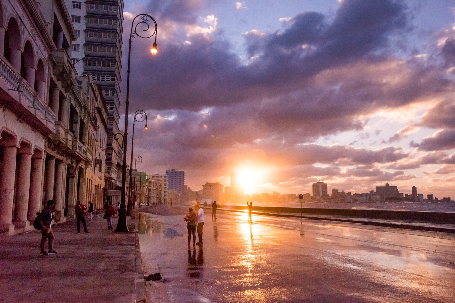 A vibrant sunset on the streets of Havanah in Cuba.
