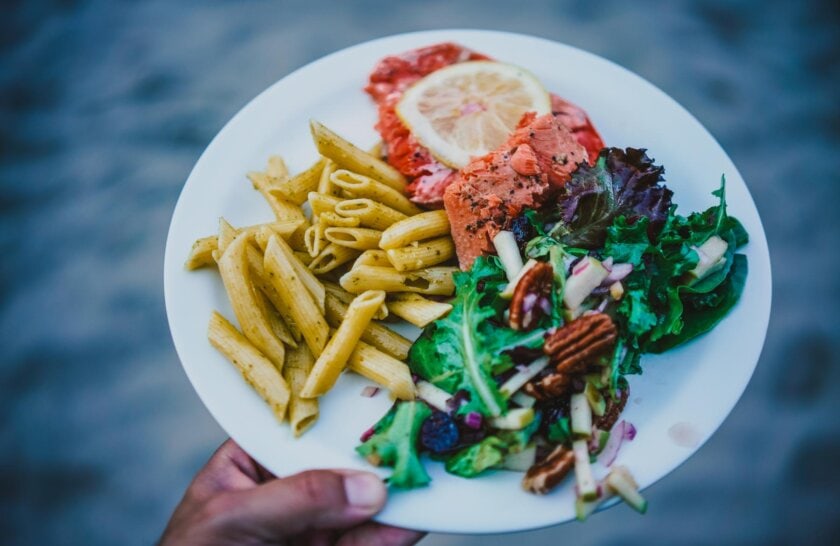A plate of salmon, pasta and salad on an OARS rafting trip on the Main Salmon River