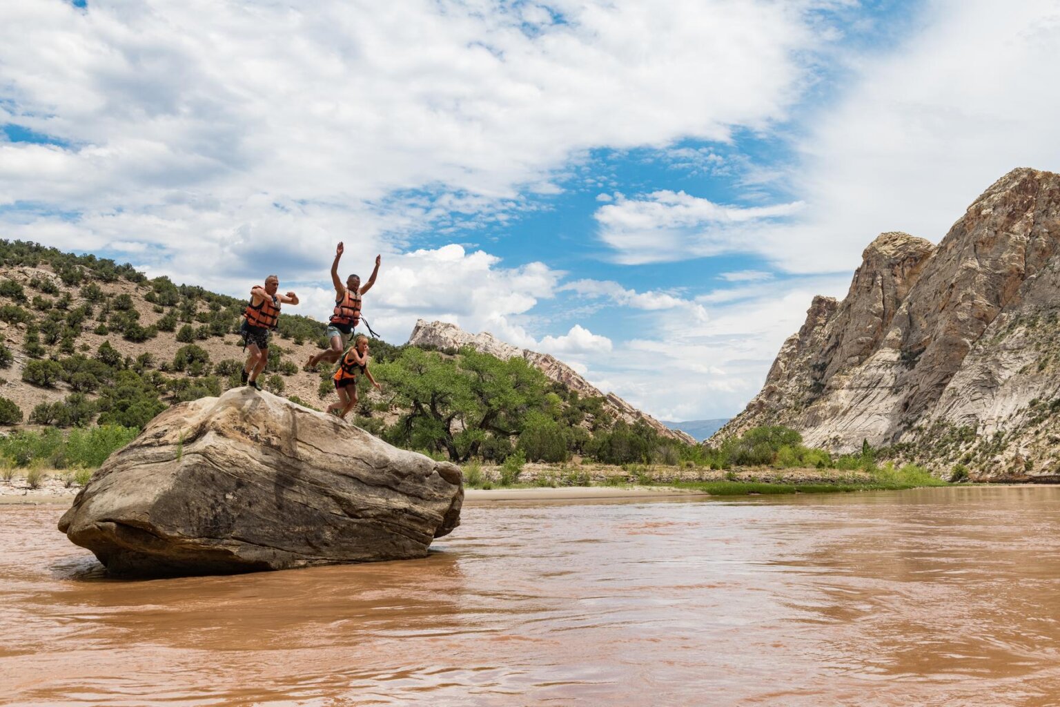 Jumping off a rock in Split Mountain Canyon.