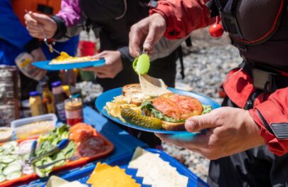 Enjoying lunch on an OARS Merced River rafting trip