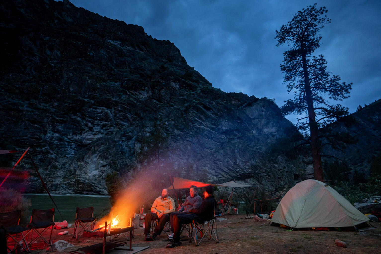 Enjoying the campfire on a beach near Idaho's Middle Fork of the Salmon River.