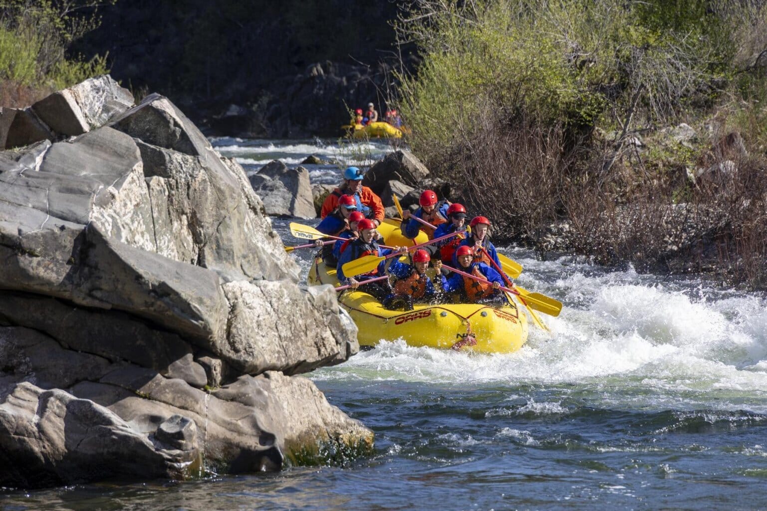 A group of whitewater rafters going through Hospital Bar Rapid on the South Fork of the American River